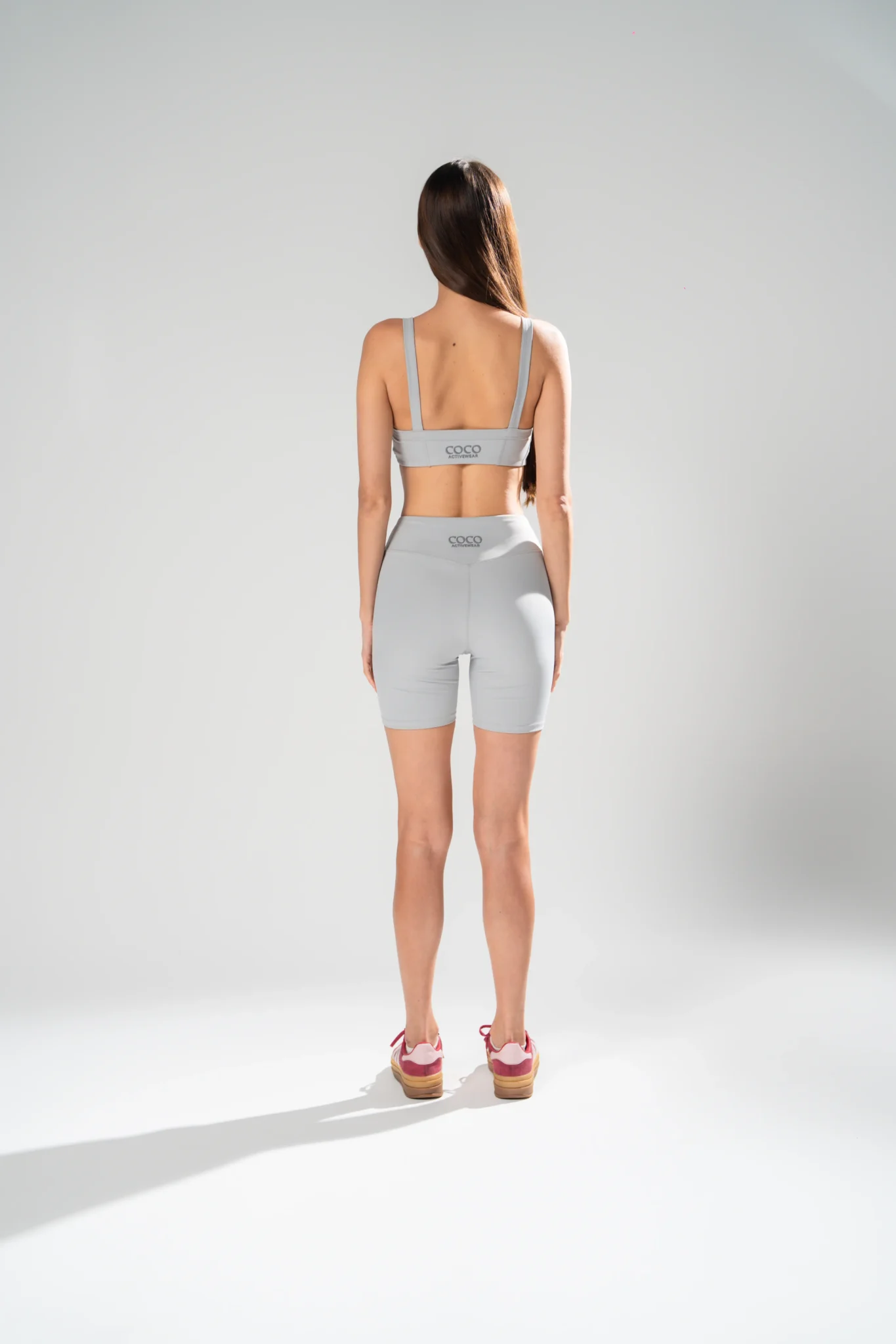 Bra and bike set in light grey, back view
